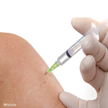 Photo d'une personne en train de se faire vacciner
